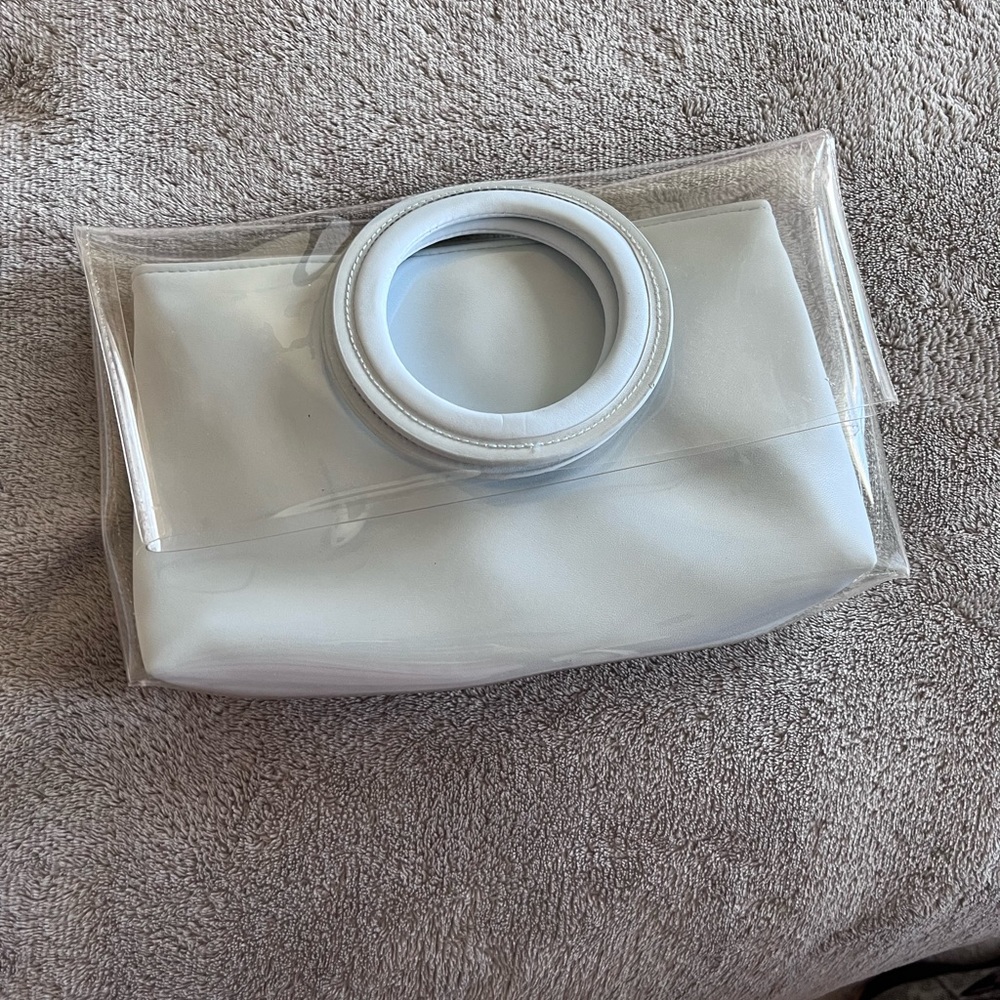 Transparent/clear clutch with blue insert